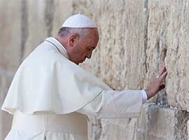 Pope Francis prays at the Western Wall in Jerusalem in May 2014. CNS photo/Paul Haring