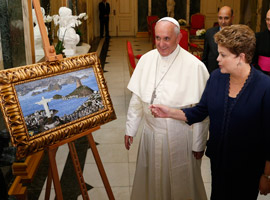 Pope Francis and Brazil's President Dilma Rousseff look at a painting of the Christ the Redeemer Statue during a welcome ceremony at the Guanabara Palace in Rio de Janeiro. (CNS photo/Paul Haring)