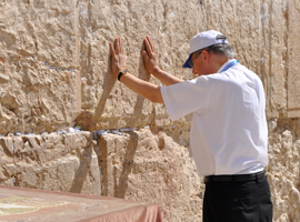 Bishop Madden offers prayers in 2010 at the Western Wall.