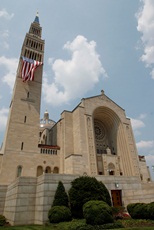 A huge flag drapes the Shrine of the Immaculate Conception. CNS Photo/Bob Roller