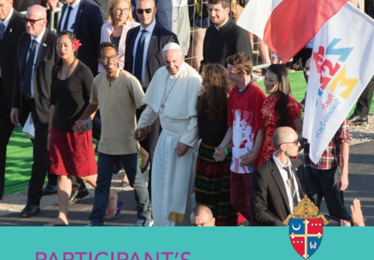 Pope Francis walking with a group of young people