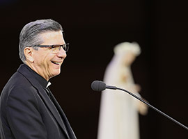 Archbishop Gustavo Garcia-Siller of San Antonio smiles while speaking at a Marian devotion during the "Convocation of Catholic Leaders: The Joy of the Gospel in America" July 1 in Orlando, Fla. (CNS photo/Bob Roller)