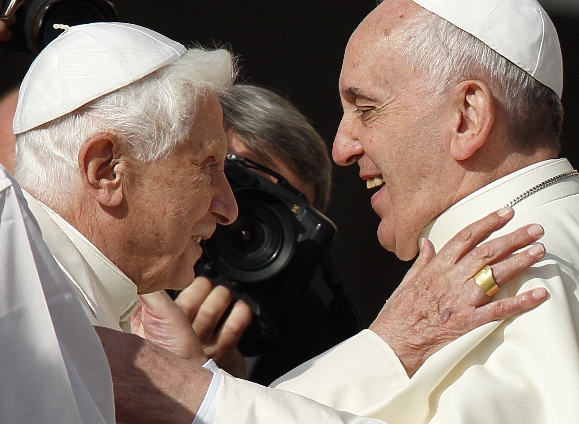 Pope Benedict XVI and Pope Francis.