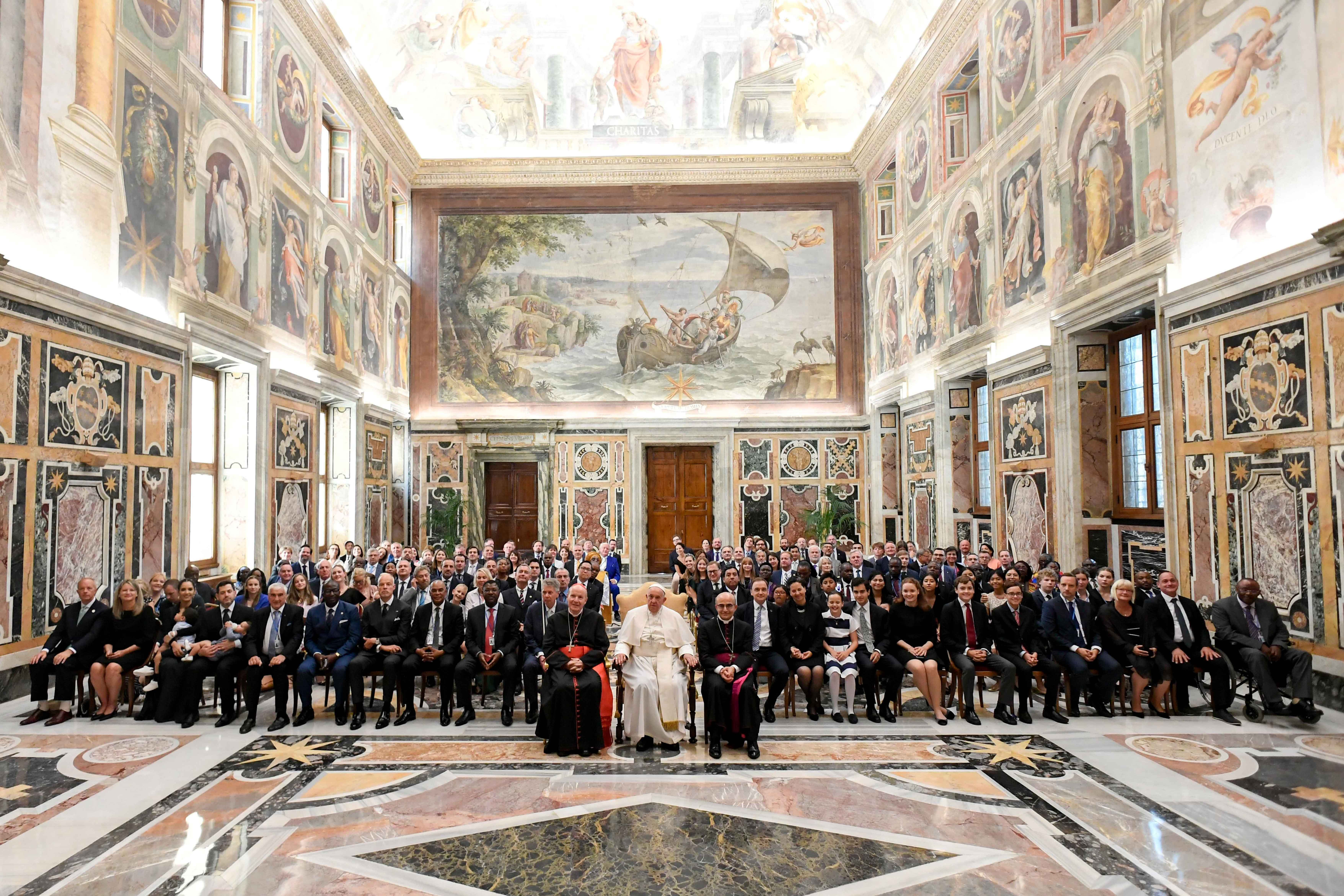 Pope Francis poses for a photo with Catholic legislators