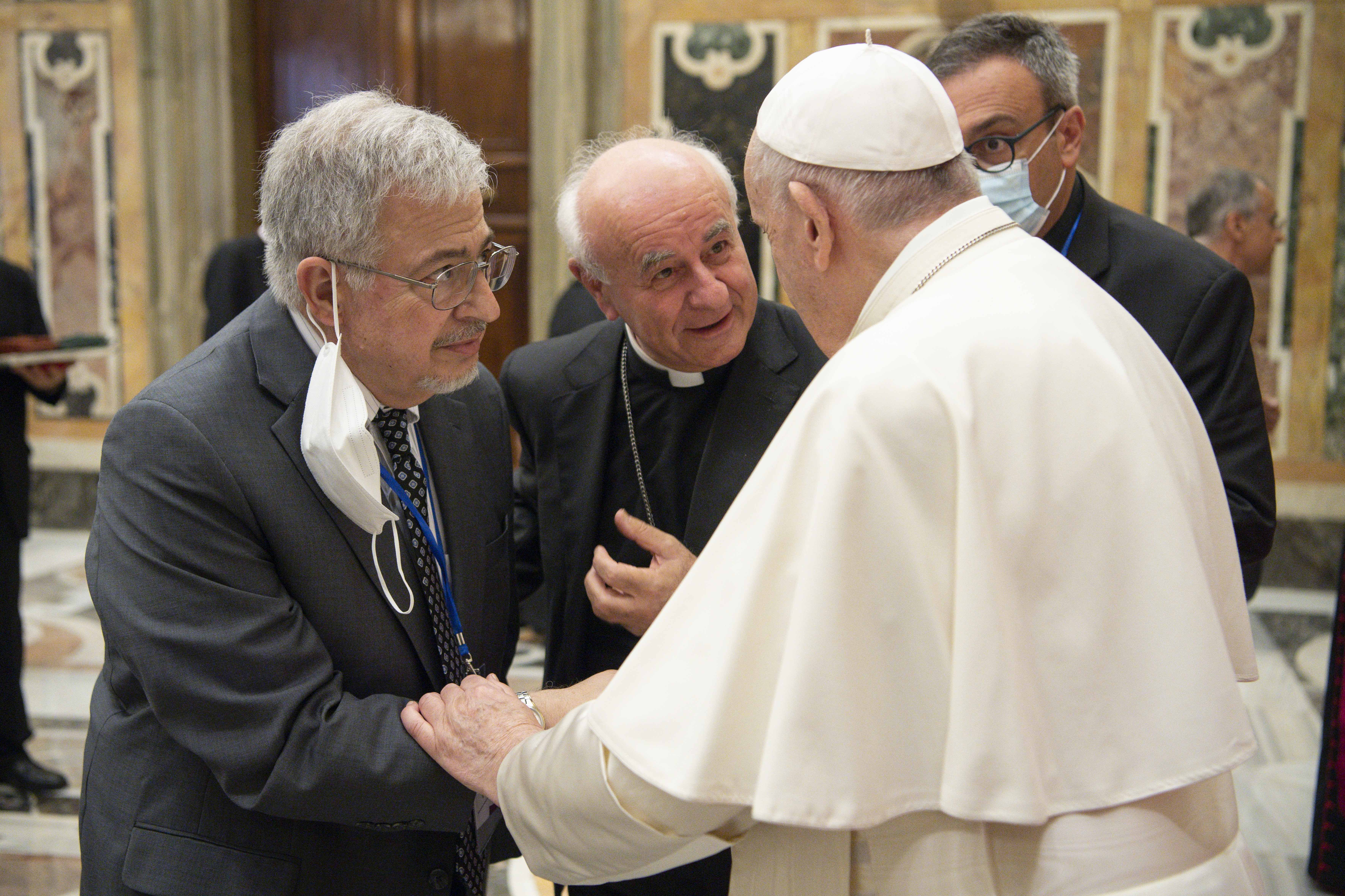 Pope Francis welcomes Dale Recinella.