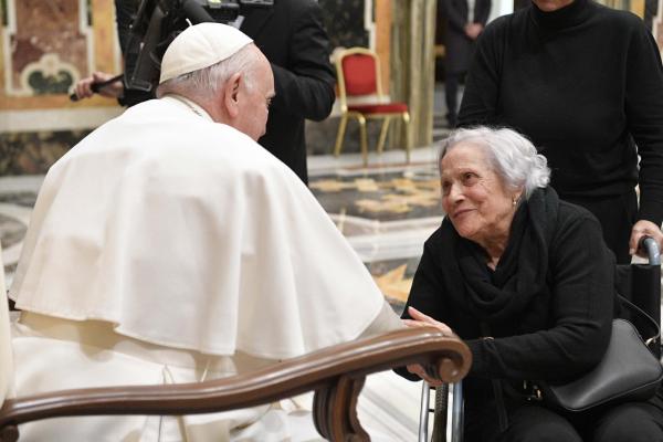 Pope Francis greets woman