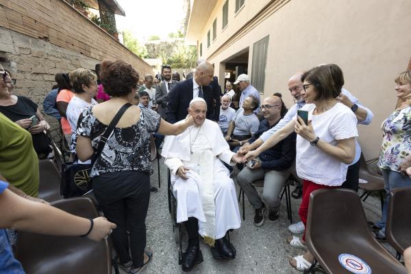 Pope Francis visits a family condominium.