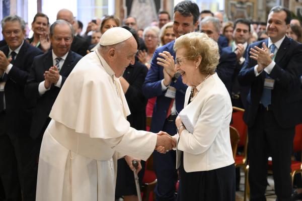 Pope Francis greets Anna Maria Tarantola.
