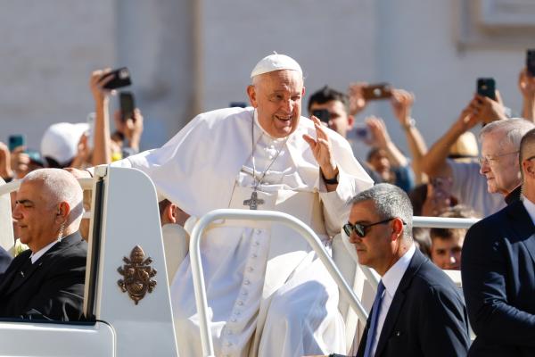 Pope Francis greets visitors. 
