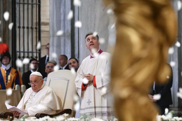 Pope Francis and an edit watch rose petals fall from basilica ceiling