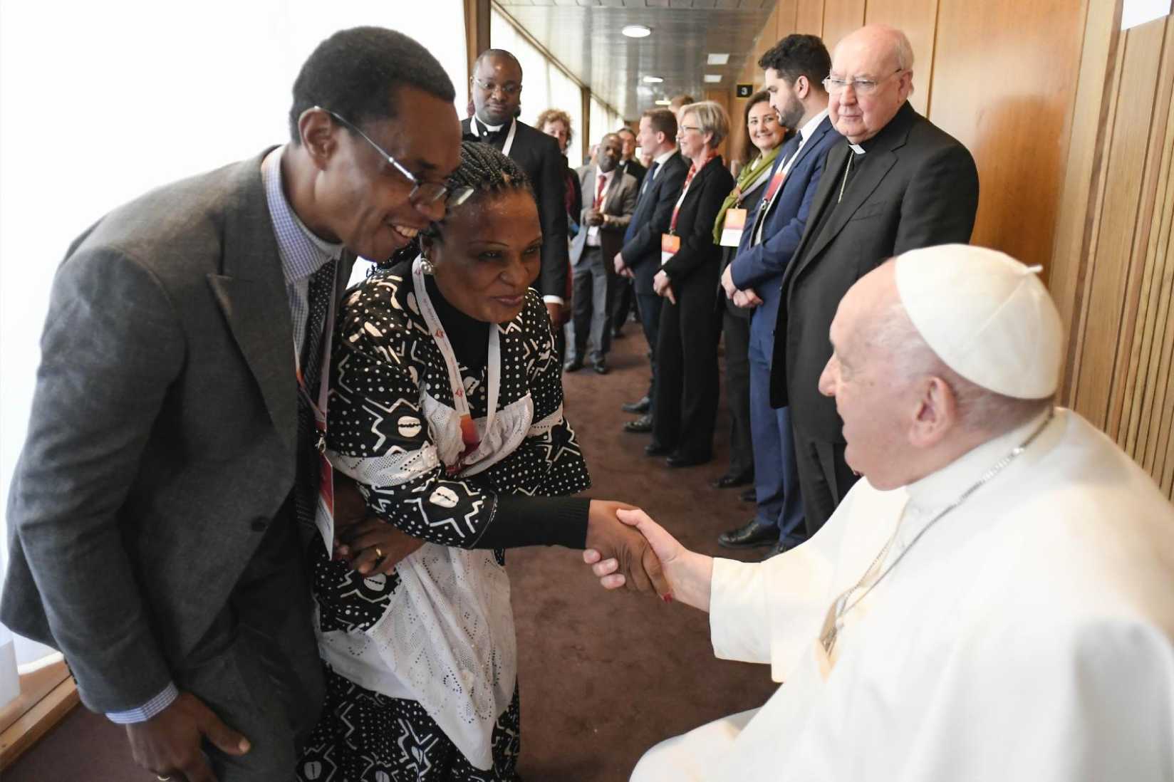 Pope Francis greets couple