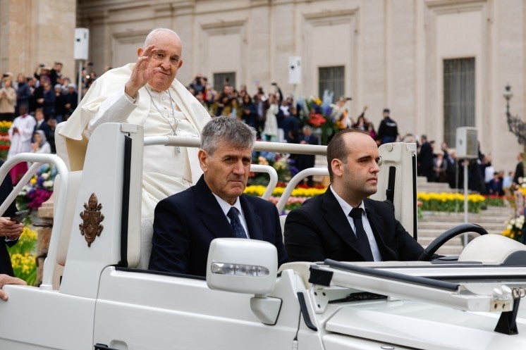 Pope Francis greets visitors. 