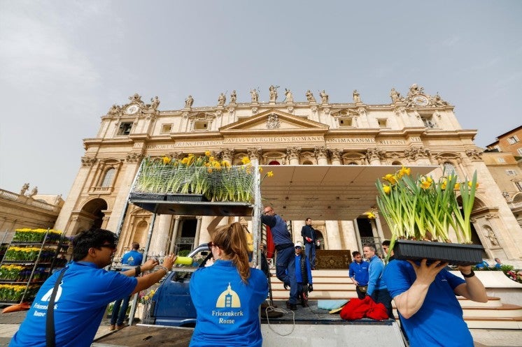 Arranging Easter flowers in St. Peter's Square