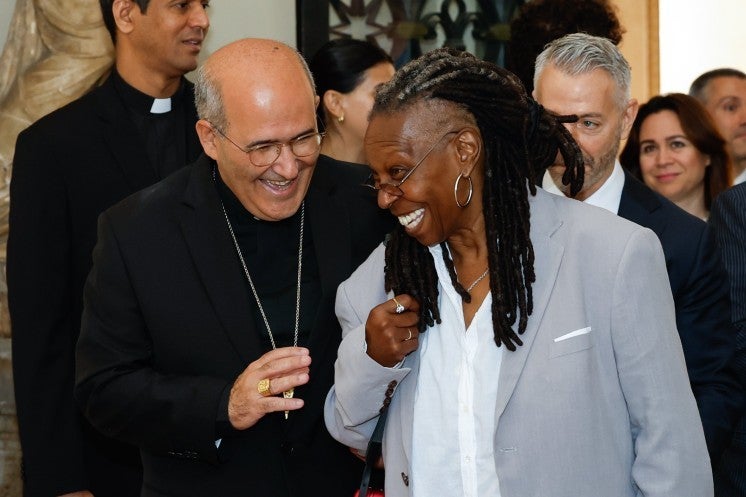 Cardinal José Tolentino de Mendonça and Whoopi Goldberg.