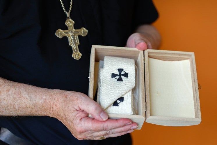 Archbishop Christopher J. Coyne of Hartford, Connecticut, displays his pallium.